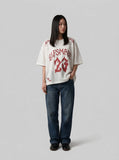 DAXUEN Oversized mesh jersey T-shirt with gothic graphics — model photo