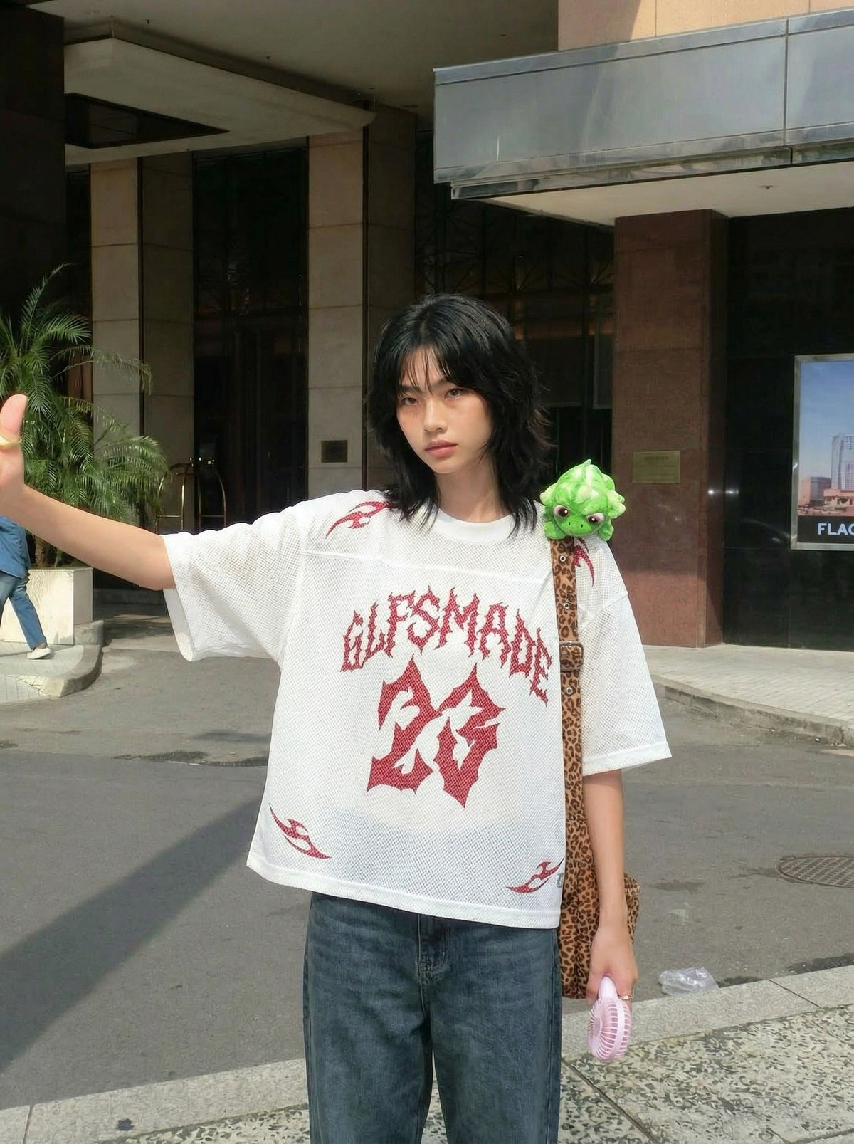 DAXUEN Oversized mesh jersey T-shirt with gothic graphics — model photo