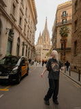 DAXUEN dark charcoal oversized gothic castle graphic tee — model photo