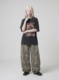 DAXUEN dark charcoal oversized gothic castle graphic tee — model photo
