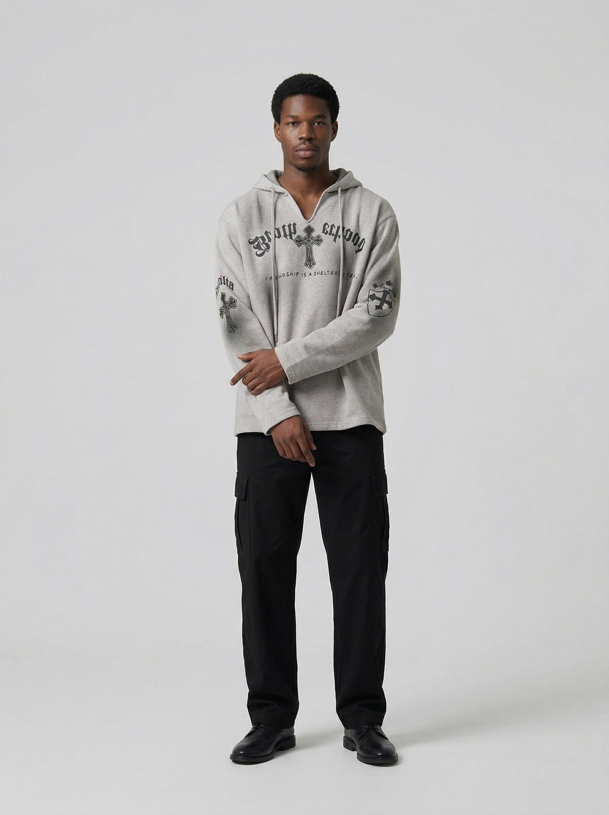 DAXUEN Gothic cross print oversized hoodie — model photo