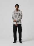 DAXUEN Gothic cross print oversized hoodie — model photo