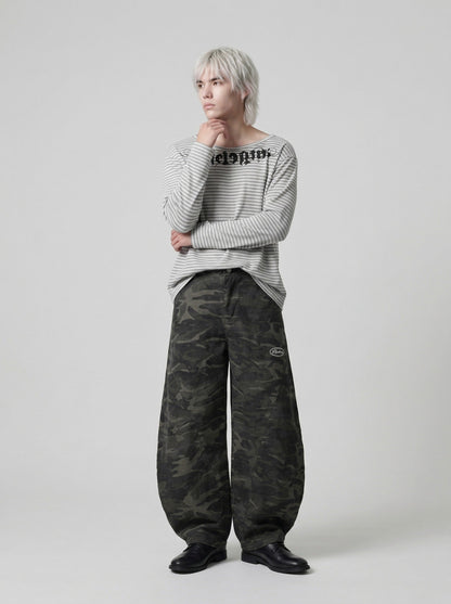 DAXUEN Gothic graphic striped long sleeve top — model photo