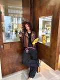 DAXUEN Black wide-leg cargo pants with gothic graphic — model photo