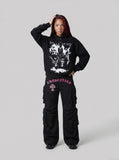 DAXUEN Black wide-leg cargo pants with gothic graphic — model photo