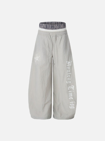 DAXUEN Gothic graphic wide-leg pants with multi-layered waistband