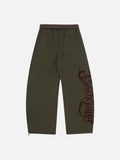 DAXUEN Wide-leg sweatpants with gothic graphic