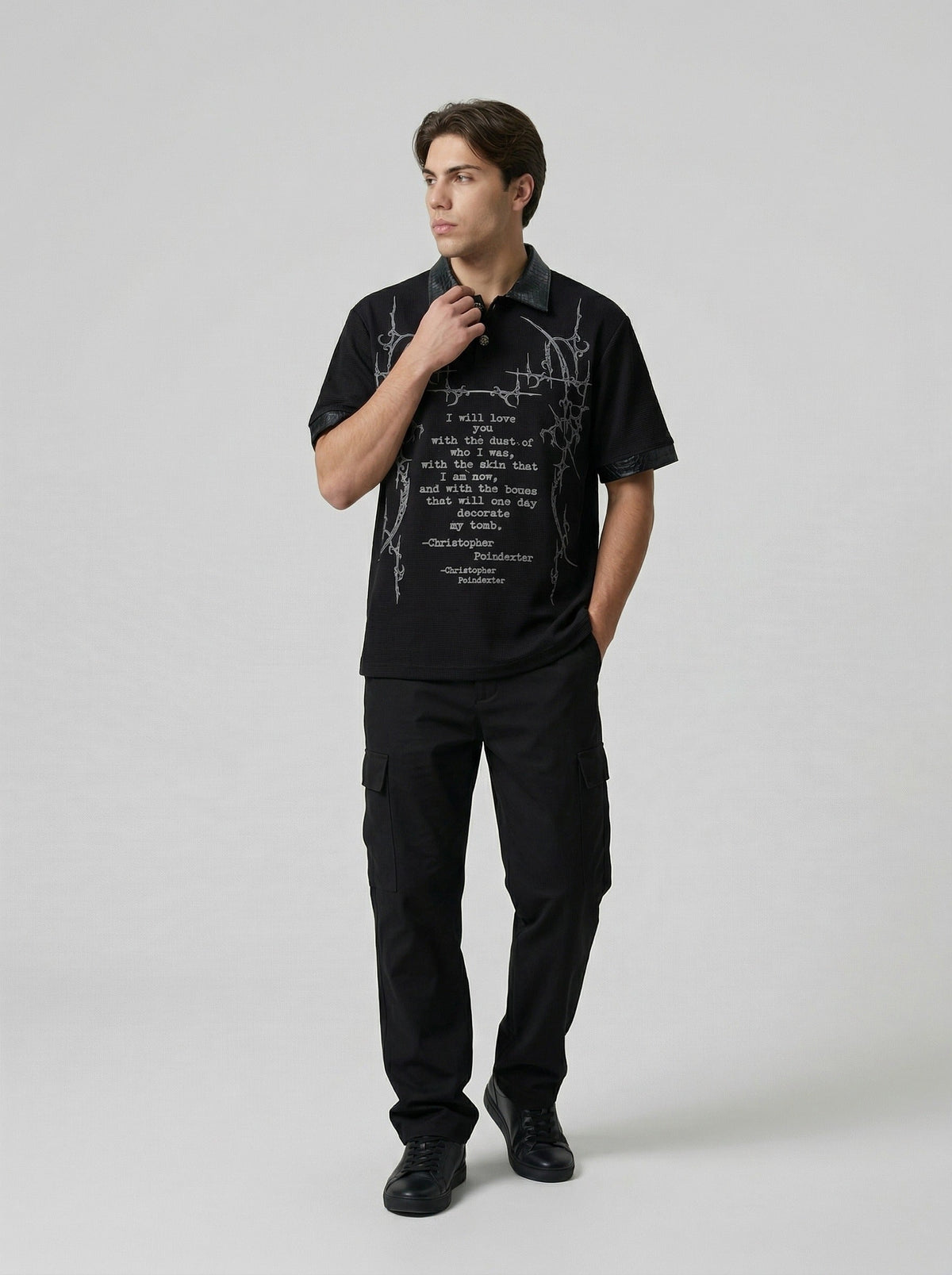 DAXUEN Black short-sleeved polo shirt with graphic print — model photo