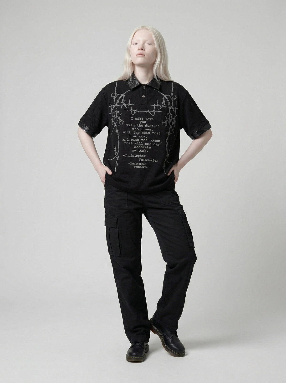 DAXUEN Black short-sleeved polo shirt with graphic print — model photo