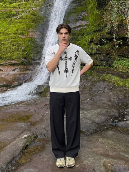 DAXUEN Gothic skull dagger graphic short-sleeve knit top — model photo