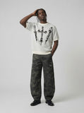 DAXUEN Gothic skull graphic short-sleeve crew neck top — model photo
