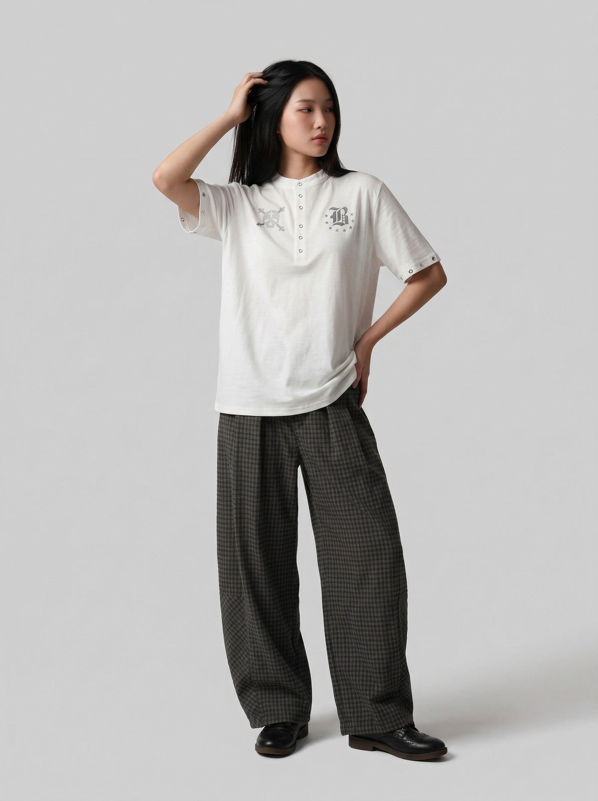 DAXUEN Gothic Skull Graphic Henley T-Shirt — model photo