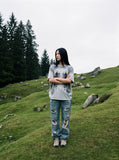 DAXUEN grey oversized gothic graphic tee — model photo