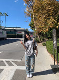 DAXUEN grey oversized gothic graphic tee — model photo