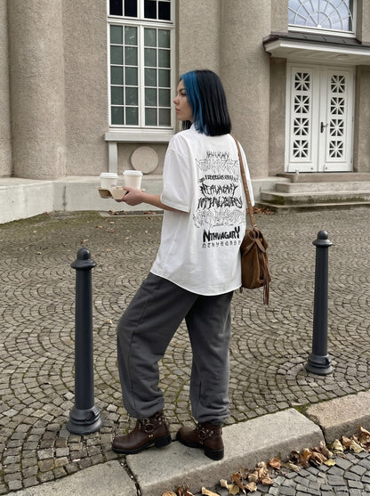 DAXUEN Gothic text button-up shirt in black and white — model photo