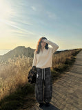 DAXUEN Gothic tie-dye wide-leg pants — model photo