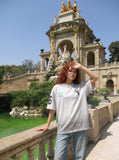 DAXUEN Gradient distressed graphic T-shirt — model photo