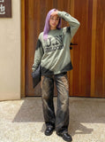 DAXUEN Oversized long-sleeve crewneck pullover with gradient color blocking — model photo