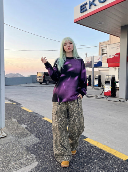 DAXUEN Black and purple gradient oversized long sleeve tee — model photo