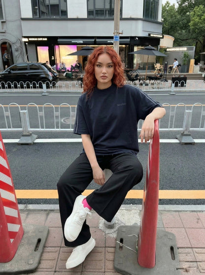 DAXUEN Oversized gradient t-shirt with stripes and raw hem — model photo