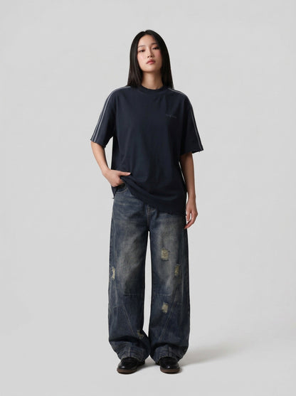 DAXUEN Oversized gradient t-shirt with stripes and raw hem — model photo