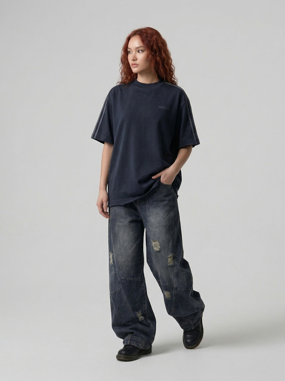 DAXUEN Oversized gradient t-shirt with stripes and raw hem — model photo