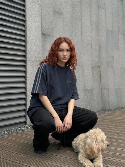 DAXUEN Oversized gradient t-shirt with stripes and raw hem — model photo