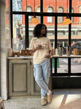 DAXUEN Graffiti print crewneck t-shirt in beige and black — model photo