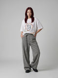 DAXUEN Oversized T-shirt with graffiti print — model photo