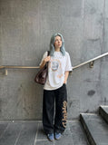 DAXUEN Oversized T-shirt with graffiti print