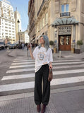 DAXUEN Oversized T-shirt with graffiti print — model photo
