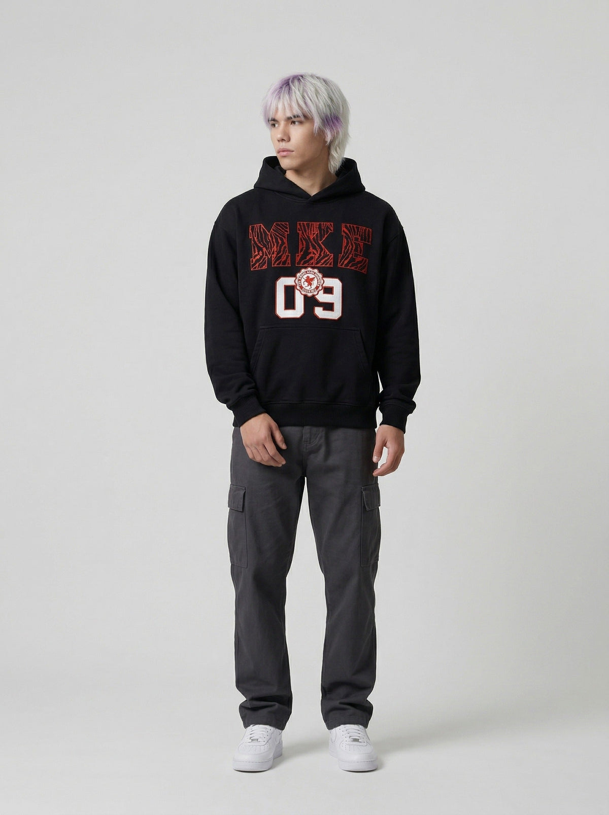 DAXUEN Pullover hoodie with graphic text and kangaroo pocket — model photo
