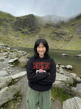 DAXUEN Pullover hoodie with graphic text and kangaroo pocket — model photo