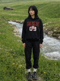 DAXUEN Pullover hoodie with graphic text and kangaroo pocket — model photo