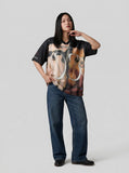 DAXUEN Oversized black graphic V-neck T-shirt with canine print — model photo