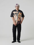 DAXUEN Oversized black graphic V-neck T-shirt with canine print — model photo
