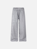 DAXUEN grey and black wide-leg sweatpants with bold cross graphic