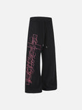 DAXUEN grey and black wide-leg sweatpants with bold cross graphic