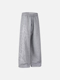 DAXUEN grey and black wide-leg sweatpants with bold cross graphic