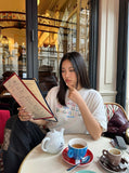 DAXUEN Flecked fabric t-shirt with embroidered graphic — model photo
