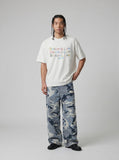 DAXUEN Flecked fabric t-shirt with embroidered graphic — model photo
