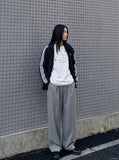 DAXUEN Flecked fabric t-shirt with embroidered graphic — model photo