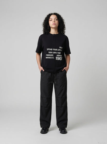 DAXUEN Short-sleeve Henley T-shirt with graphic design — model photo