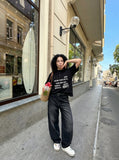 DAXUEN Short-sleeve Henley T-shirt with graphic design — model photo