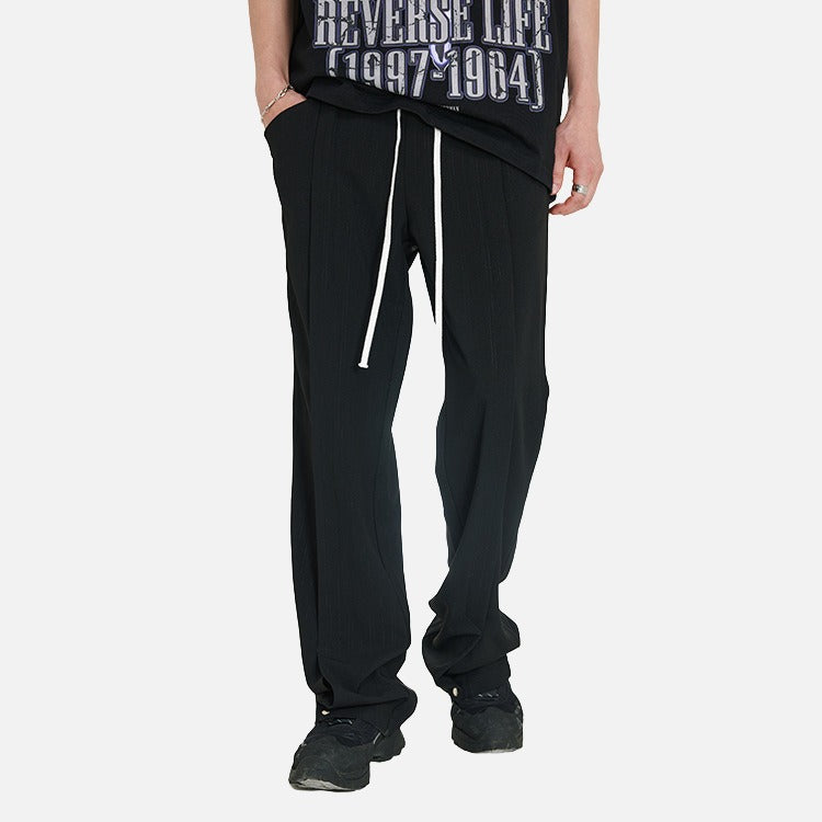 DAXUEN Black oversized graphic T-shirt and wide-leg pants — model photo