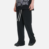 DAXUEN Black oversized graphic T-shirt and wide-leg pants — model photo
