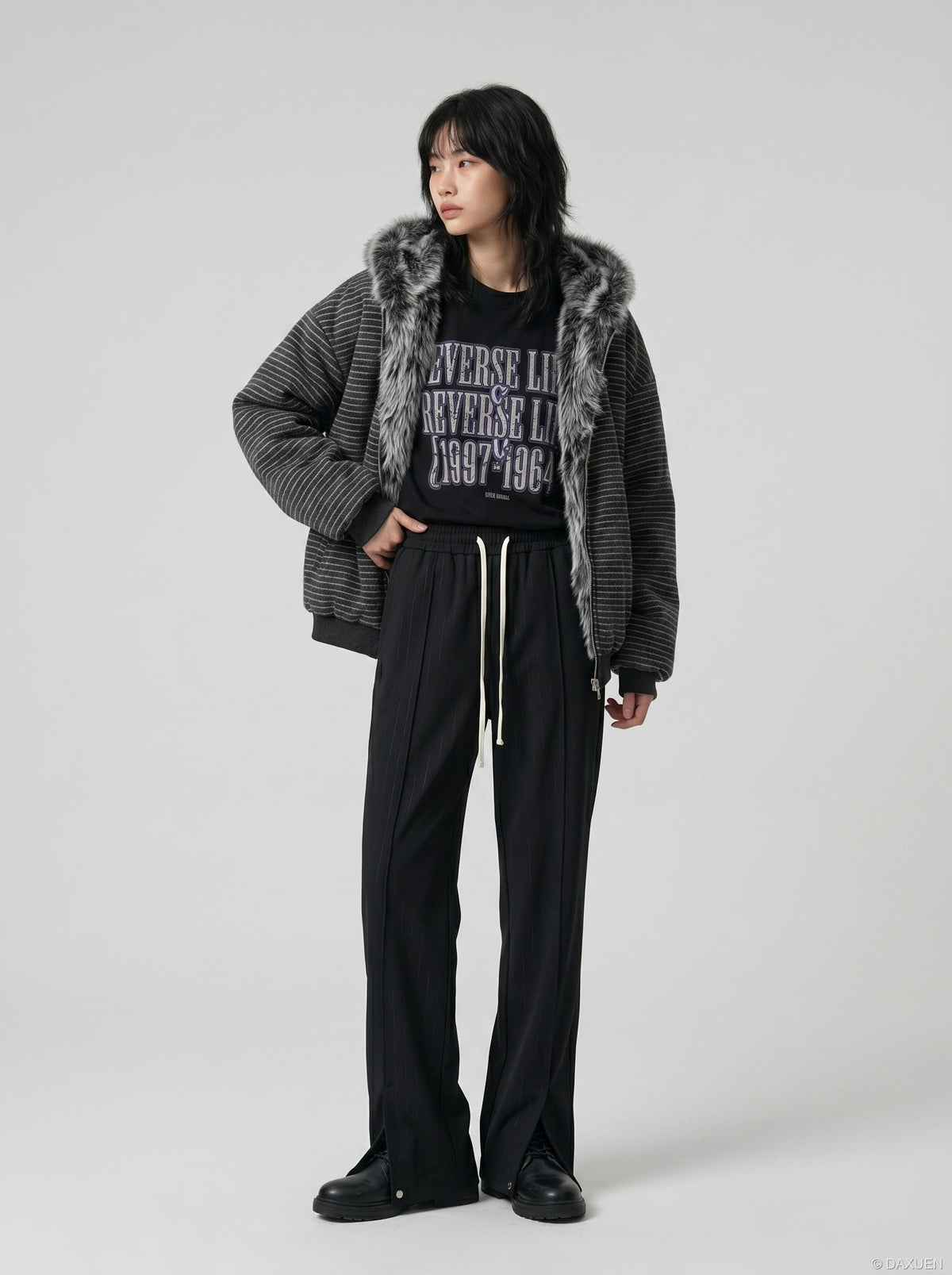 DAXUEN Black oversized graphic T-shirt and wide-leg pants — model photo