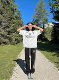 DAXUEN Graphic polo shirt with oversized fit and logos — model photo