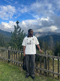 DAXUEN Graphic polo shirt with oversized fit and logos — model photo