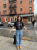 DAXUEN Black short-sleeved graphic t-shirt — model photo